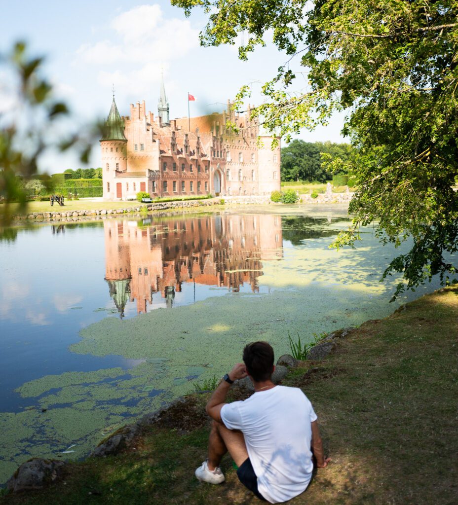 Egeskov slot man sitting grass